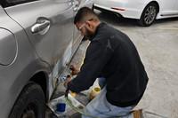 Student buffing car